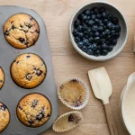 Muffins myrtilles moelleux, dôme bombé, myrtilles visibles